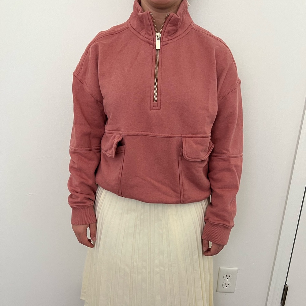 Pink pullover half zip sweater with pockets